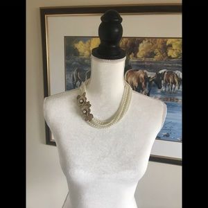 Matching faux pearl and earrings set